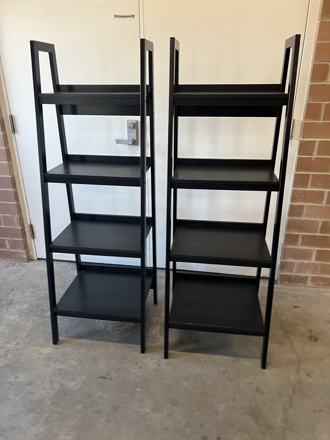 Two Black Ladder Shelf Bookcases - photo 2
