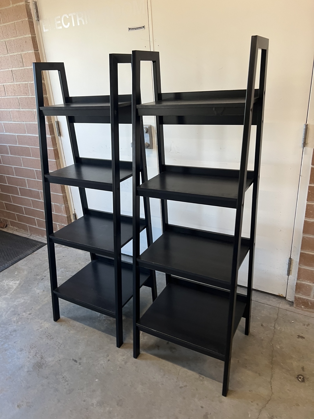 Two Black Ladder Shelf Bookcases - photo 3
