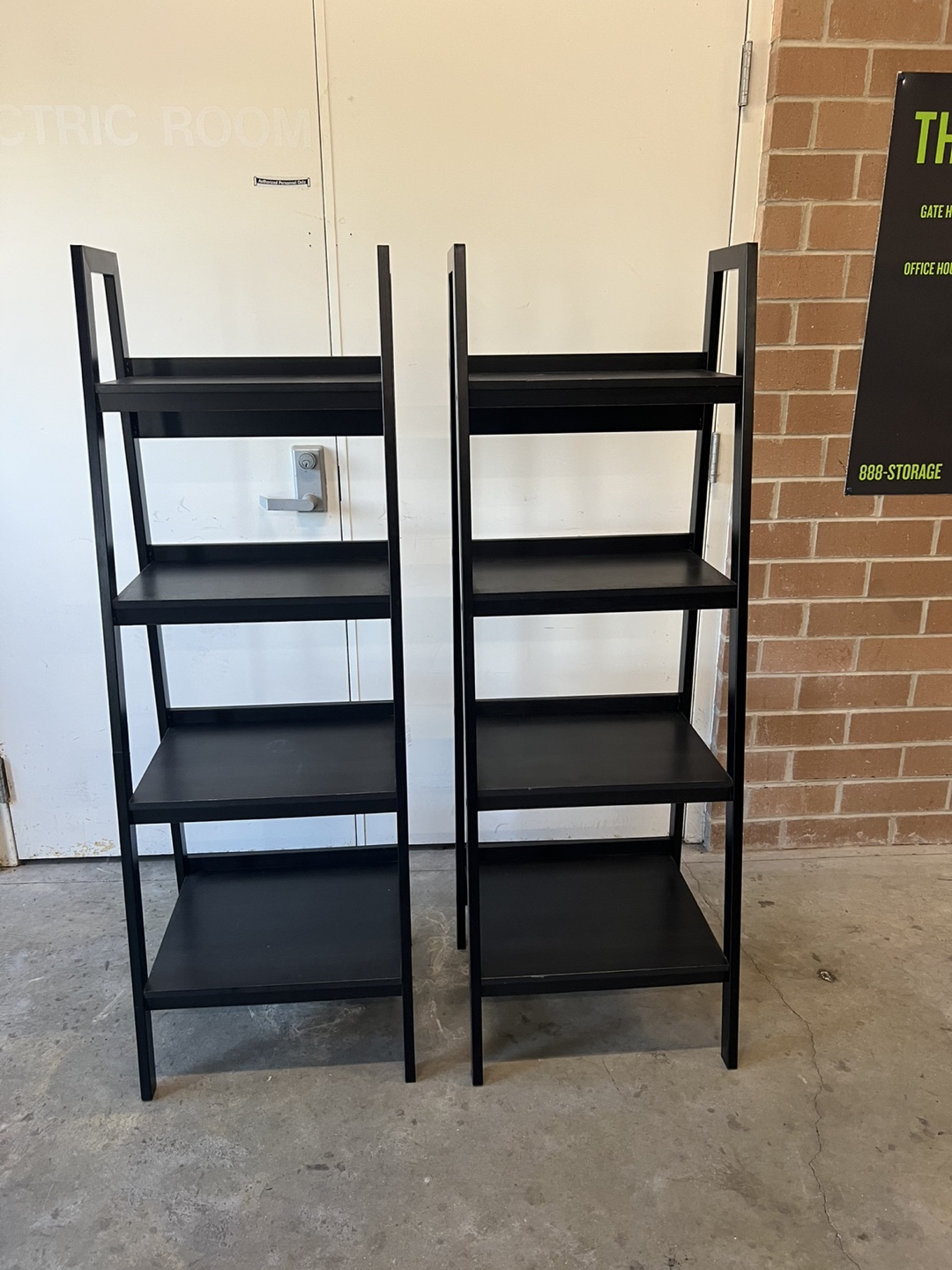 Two Black Ladder Shelf Bookcases