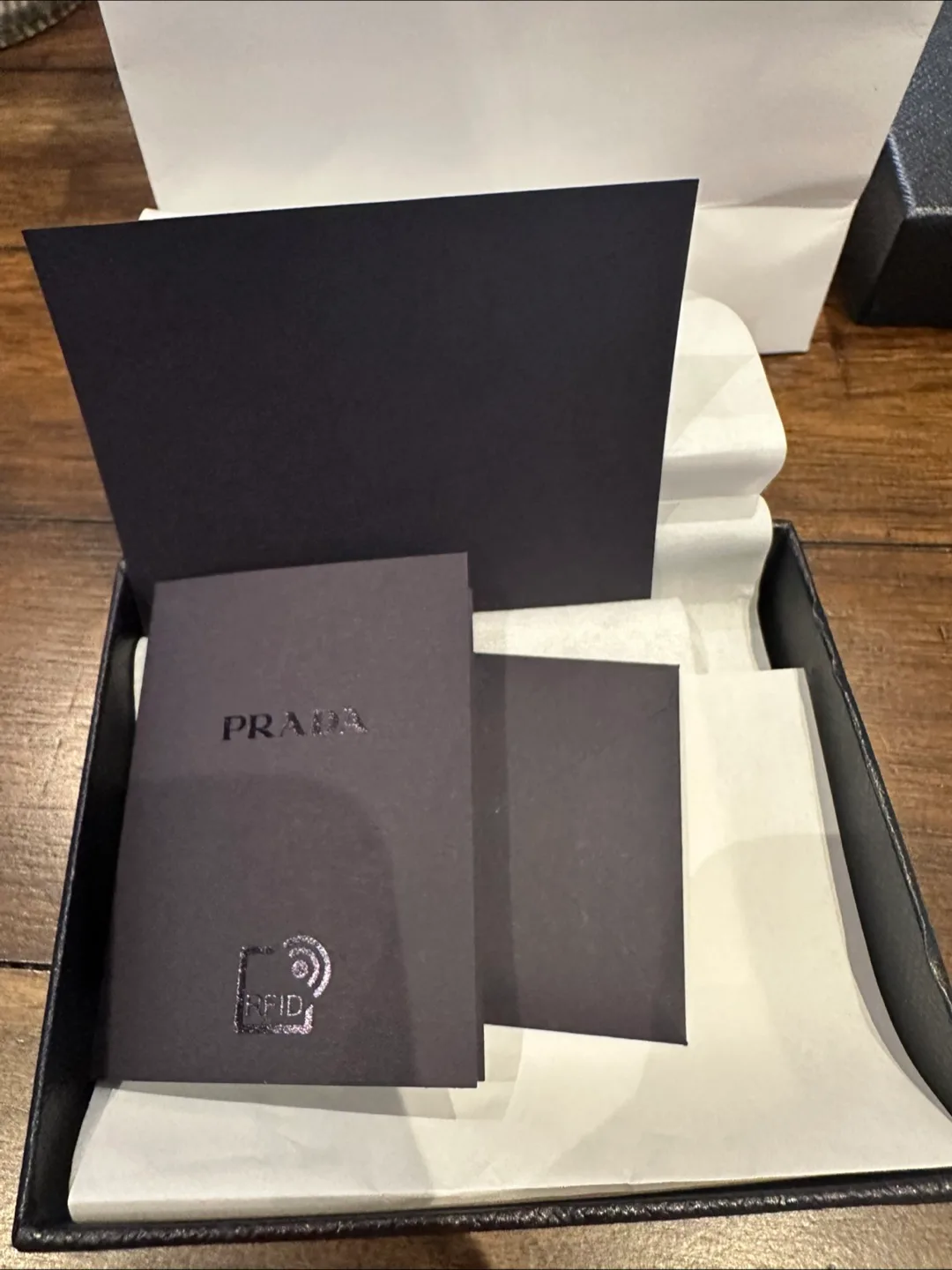 Authentic Prada Black Leather Card Holder with Authenticity Card image indicator(8)