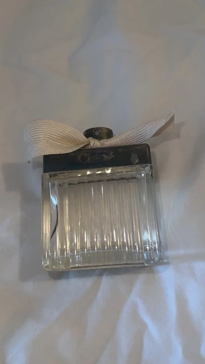 Necklace and Sunglasses plus parfume , different prices. image indicator(7)