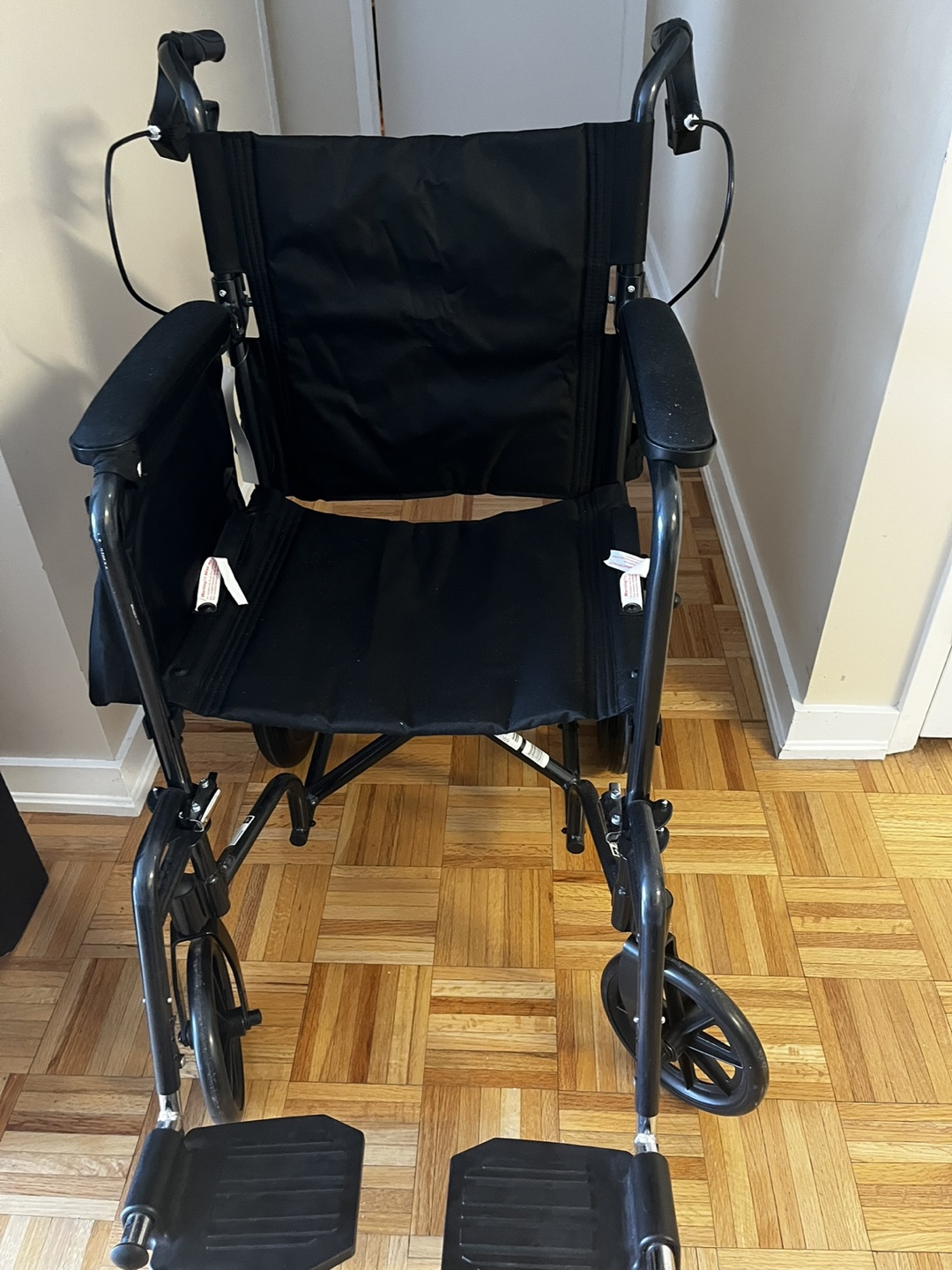 Transport wheelchair