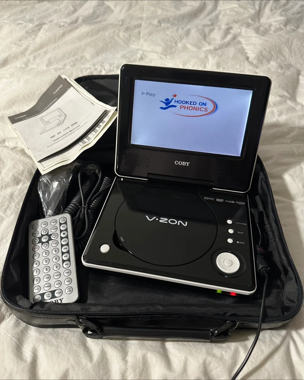 Coby V-ZON Portable DVD Player with Bag image indicator(2)