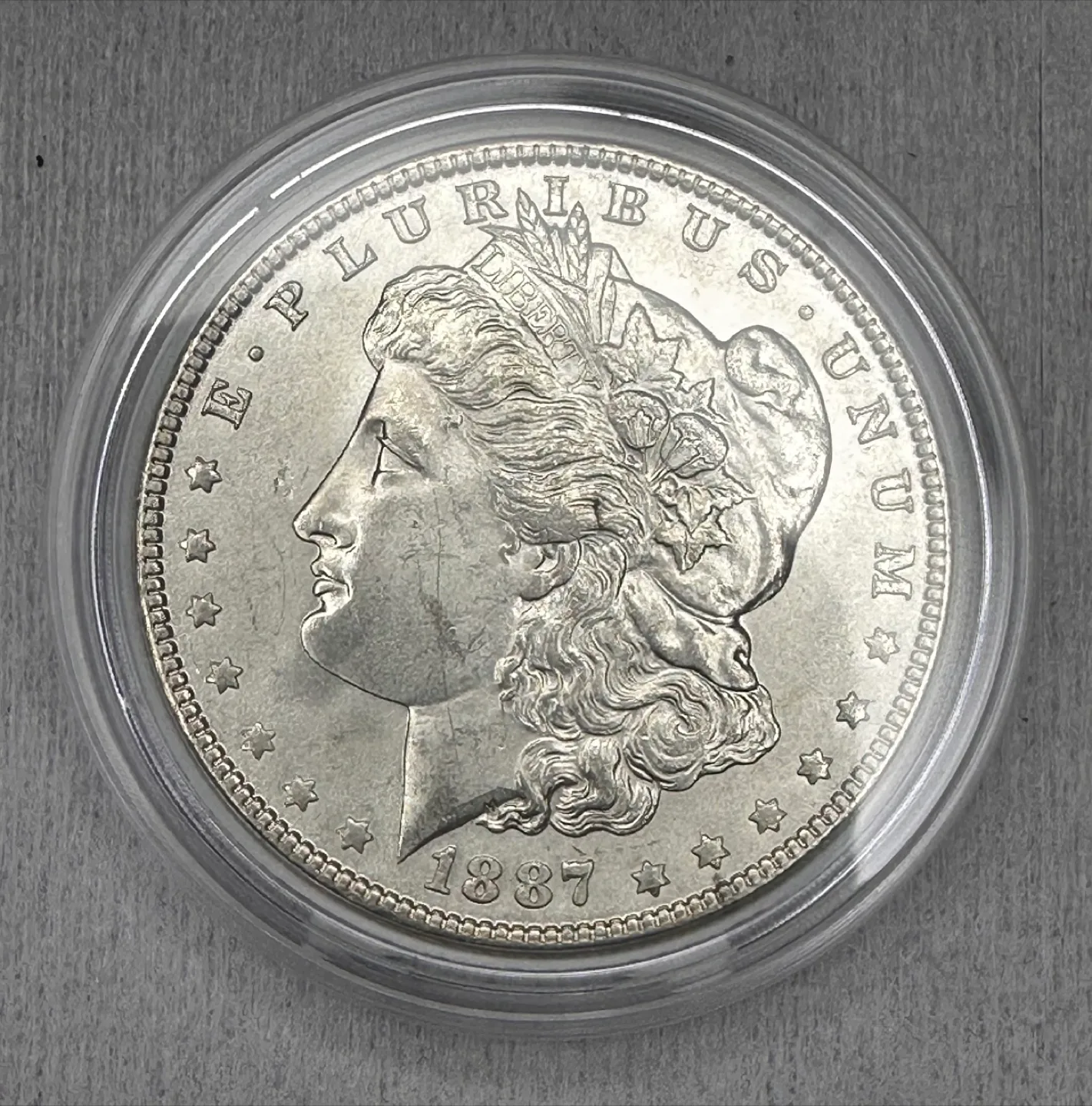 1887 USA Morgan Silver Dollar thumbnail
