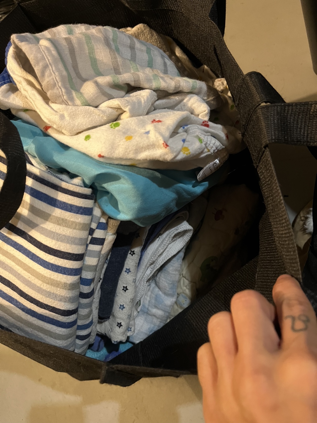 2 Bags of infant bedding + misc
