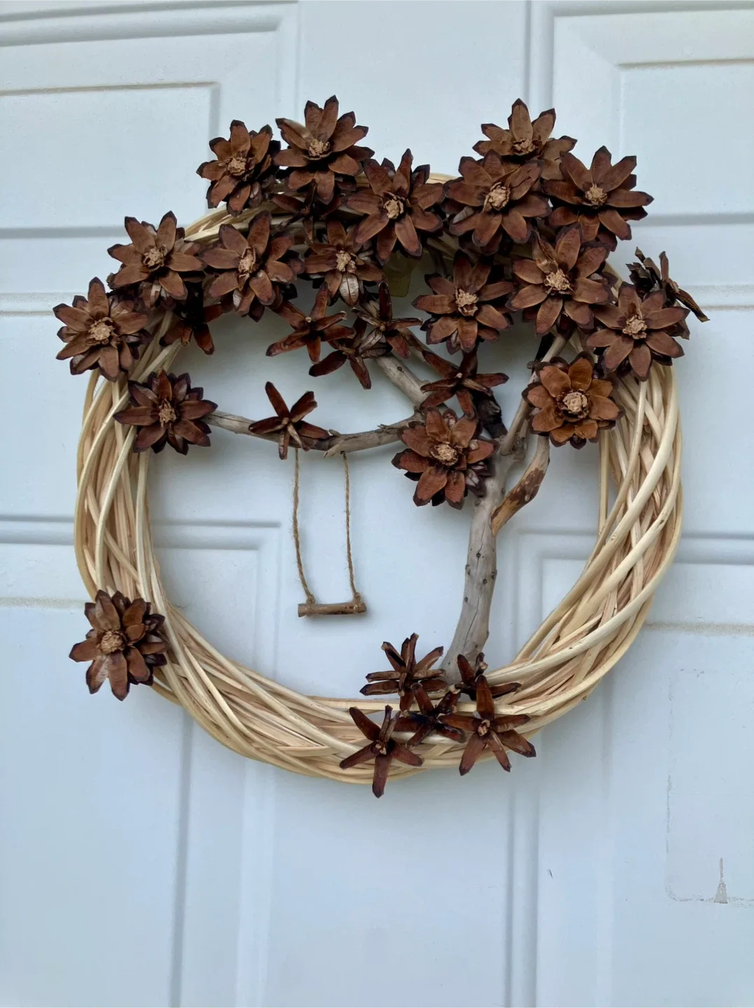 Charming Handmade Pinecone Wreath with Swing thumbnail