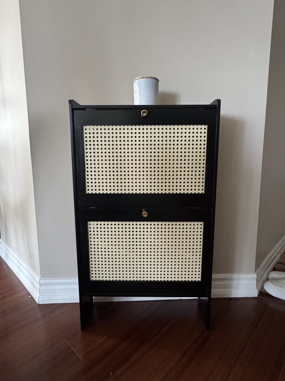 Stylish black shoe cabinet with rattan-style front panels - photo 2