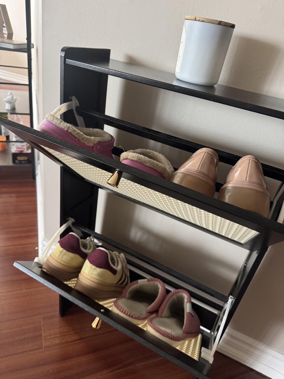 Stylish black shoe cabinet with rattan-style front panels - photo 3