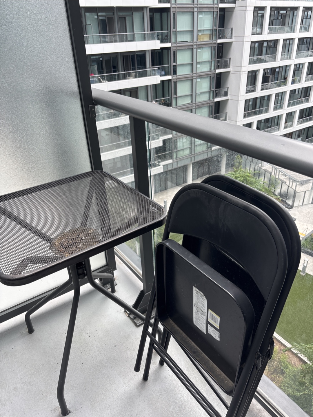 Black Folding Chairs & Metal Table Set