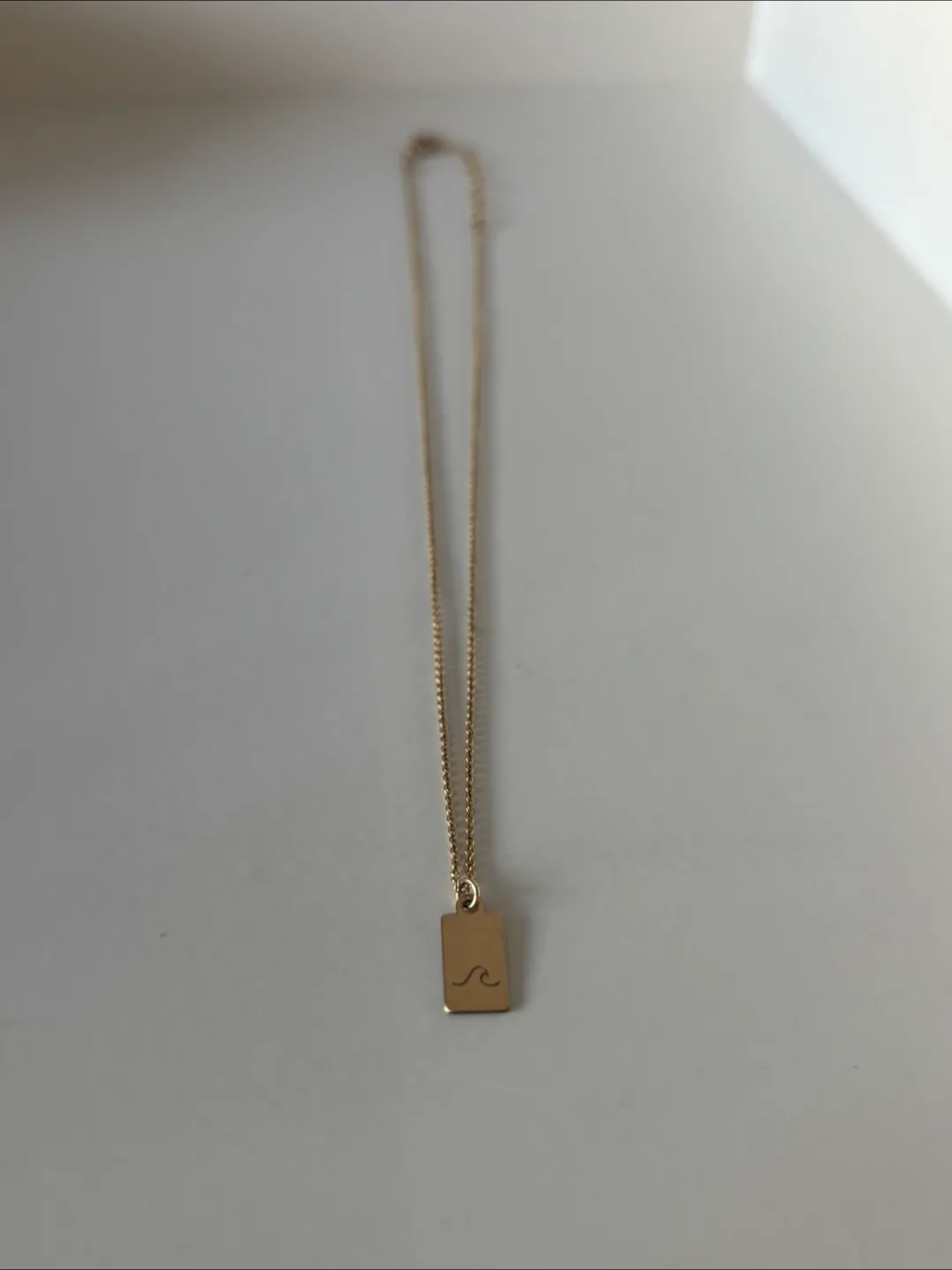 Gold Wave Pendant Necklace 16” thumbnail