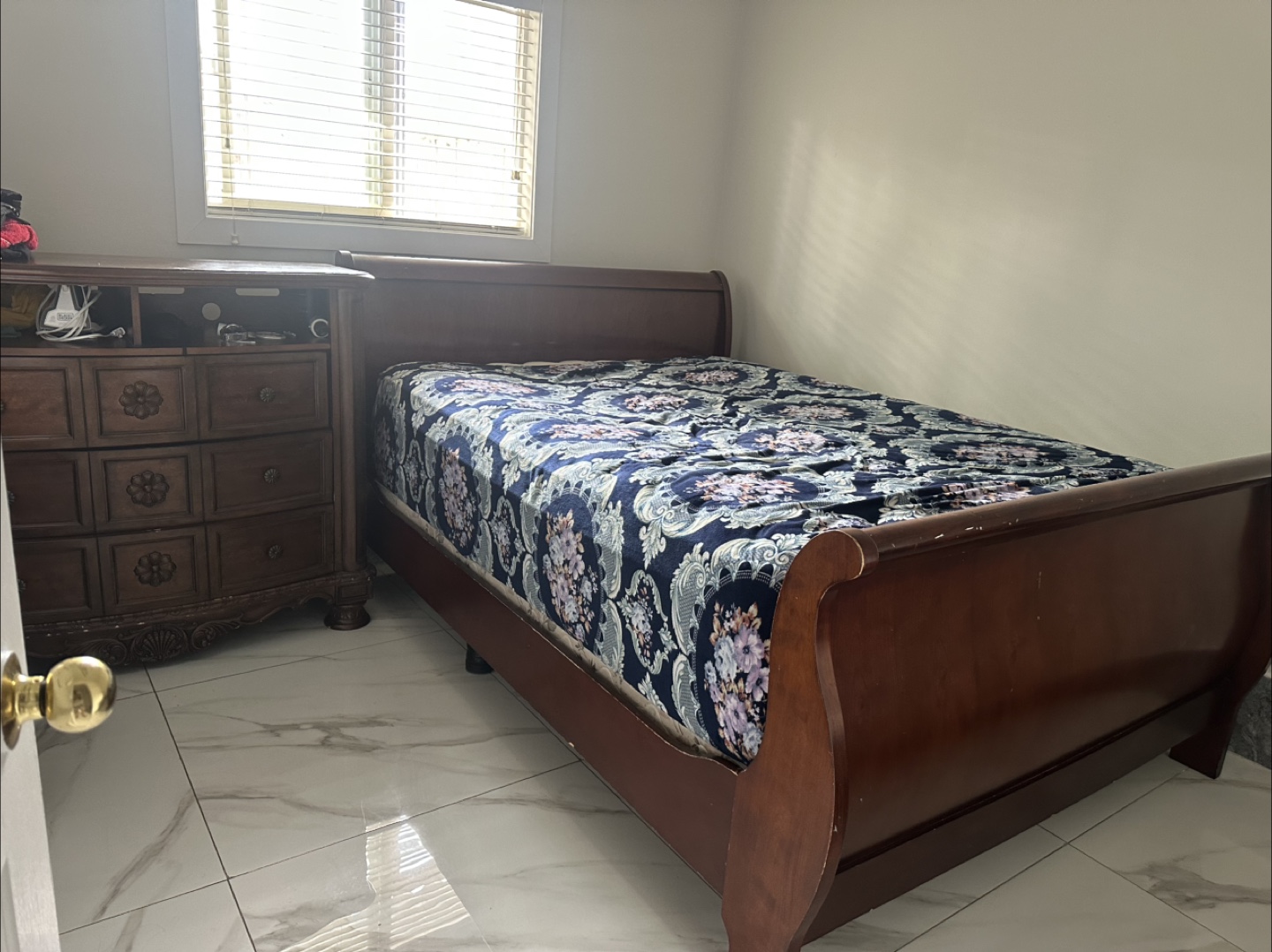 Sleigh Bed Frame with Floral Bedding