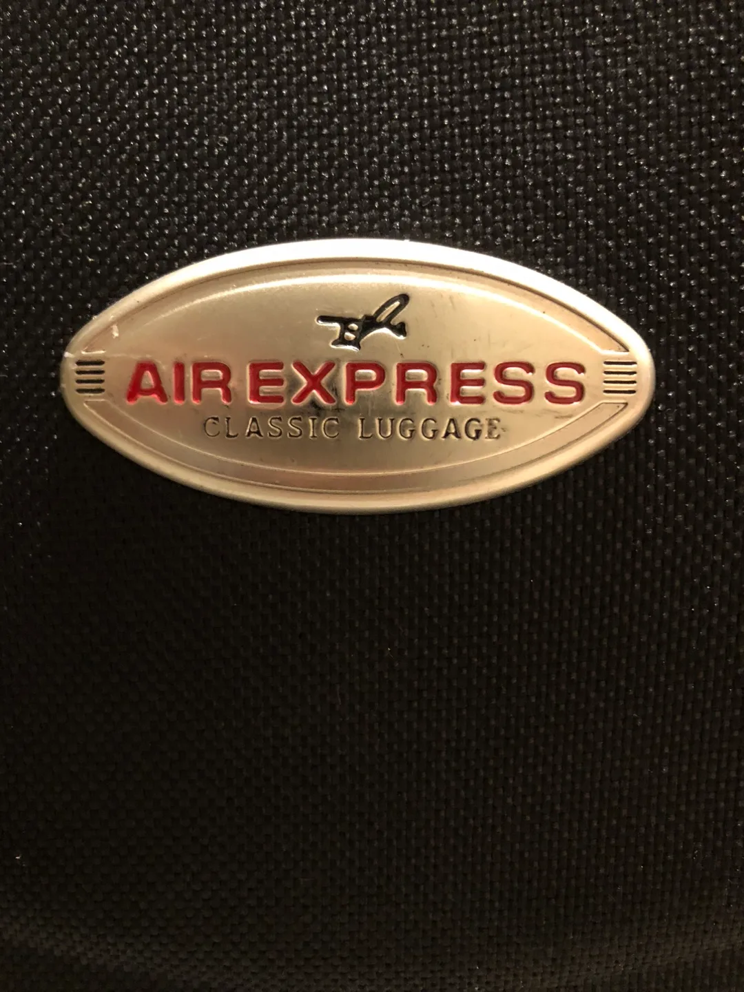AIR EXPRESS extendable suitcase checked in baggage size image indicator(6)