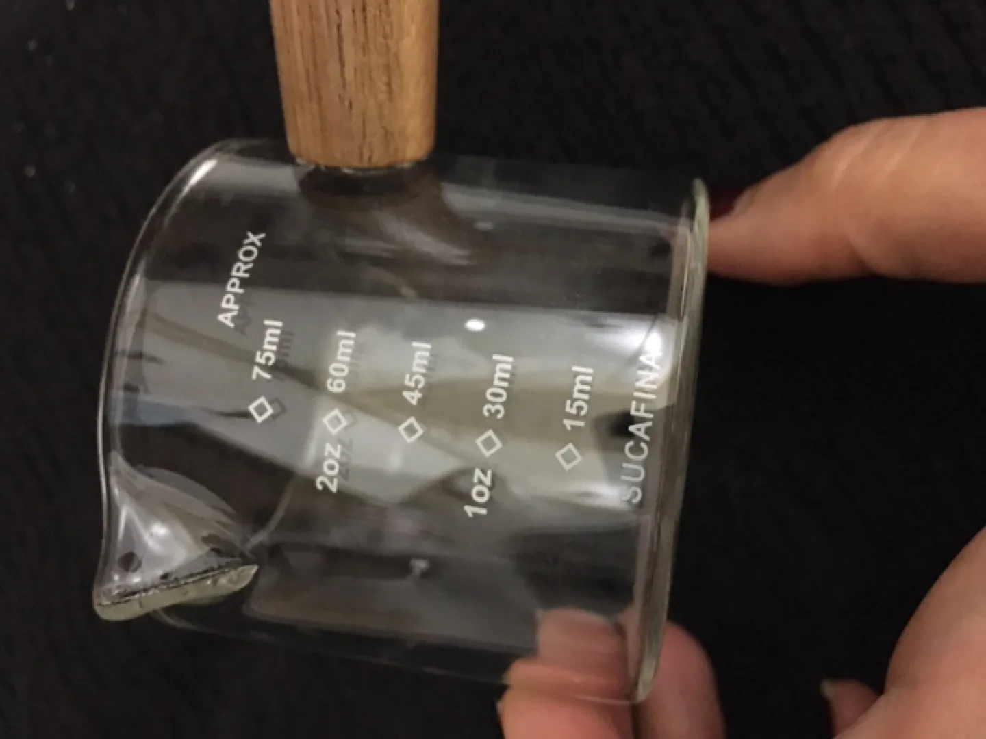 Sucafina Glass Measuring Cup with Wooden Handle image indicator(5)