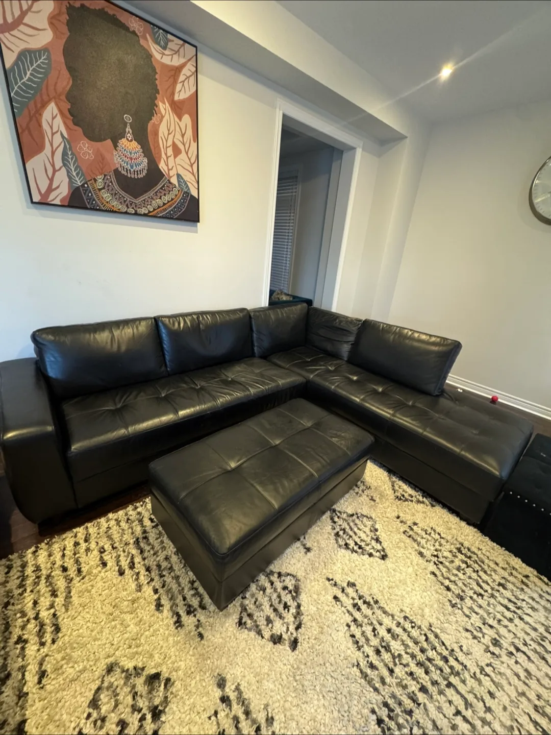 Black Leather Sectional Sofa with Ottoman