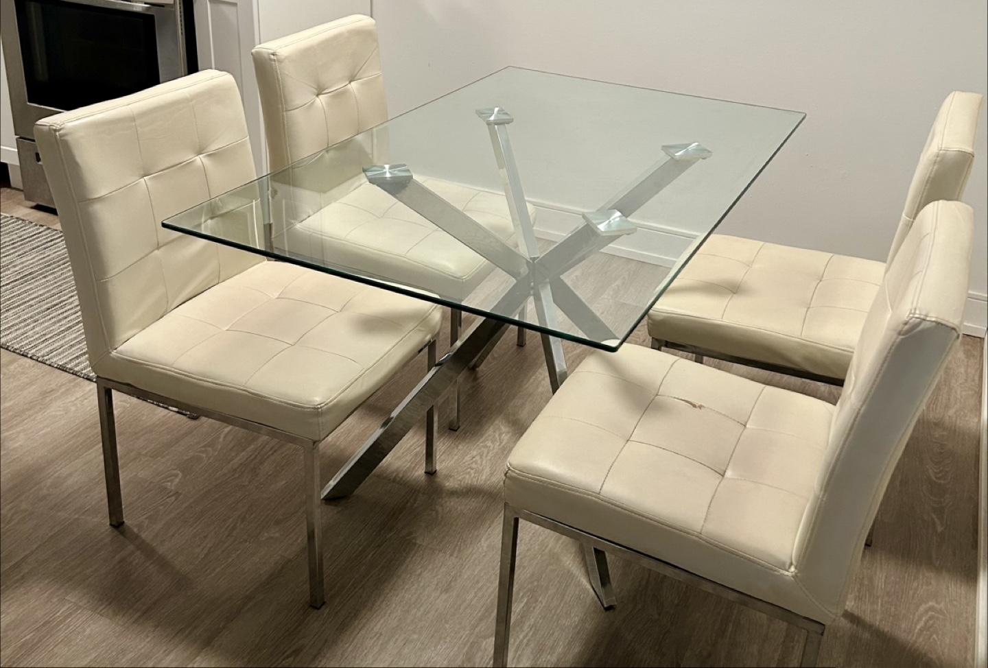 Glass Top Dining Table with 4 Cream Chairs