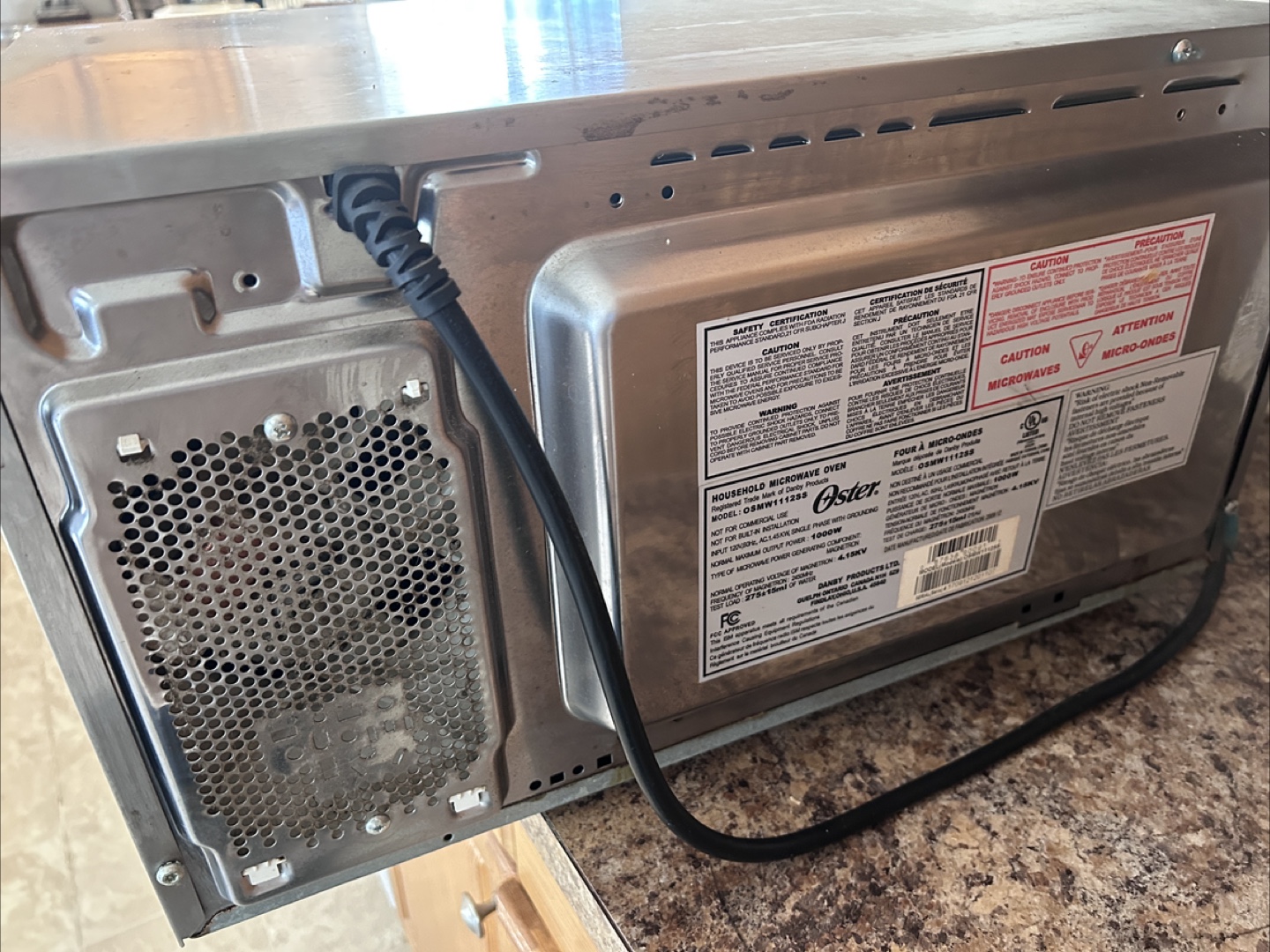 Oster Microwave Oven Model OSMW1112SS - photo 5