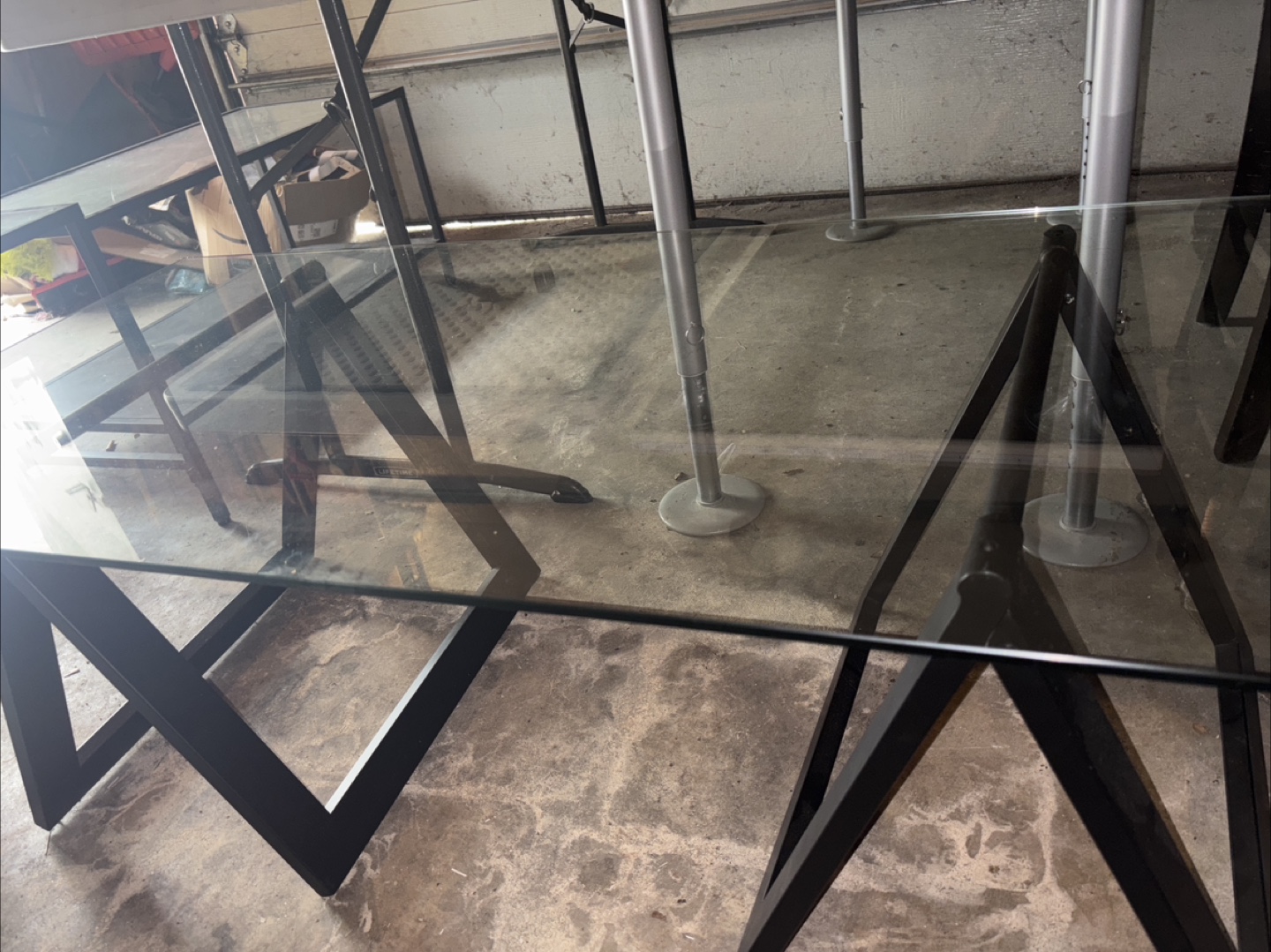Glass coffee table. Low to ground . Fold up legs