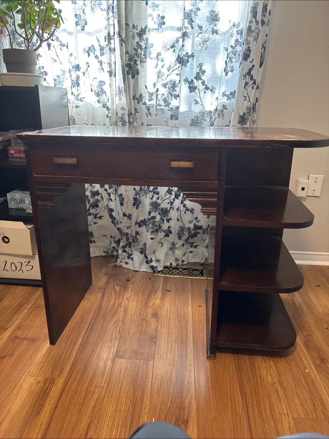 Vintage wooden desk with study lamp