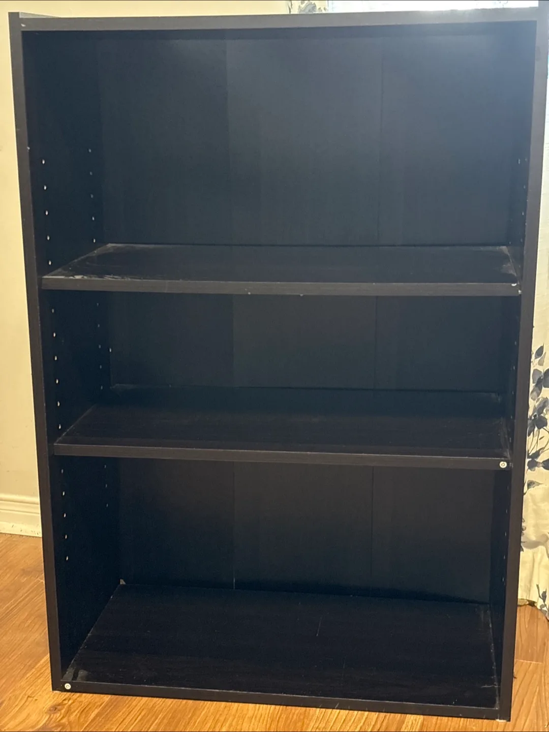 Black bookshelf.