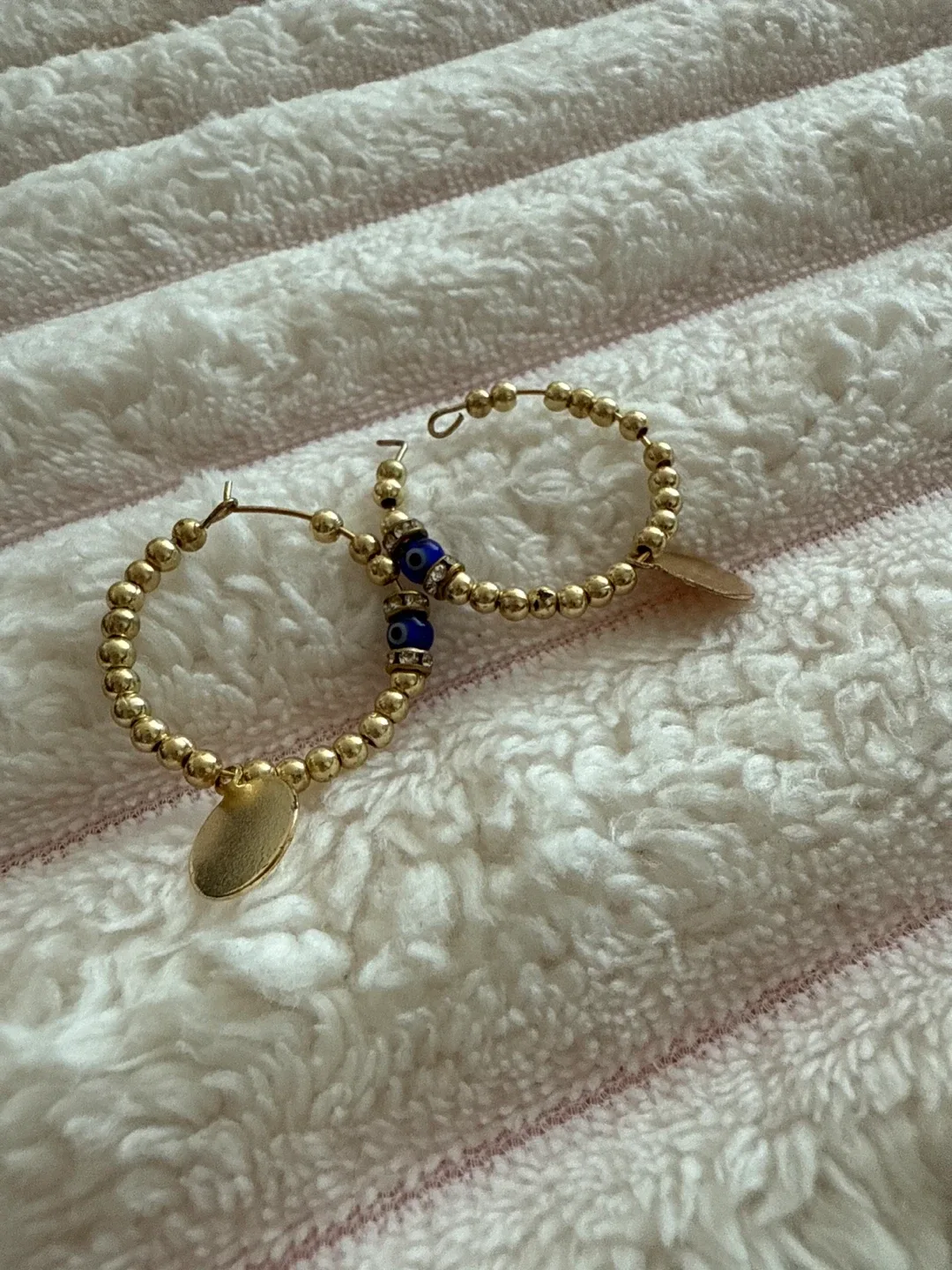 Gold Beaded Hoop Earrings with Evil Eye Detail thumbnail