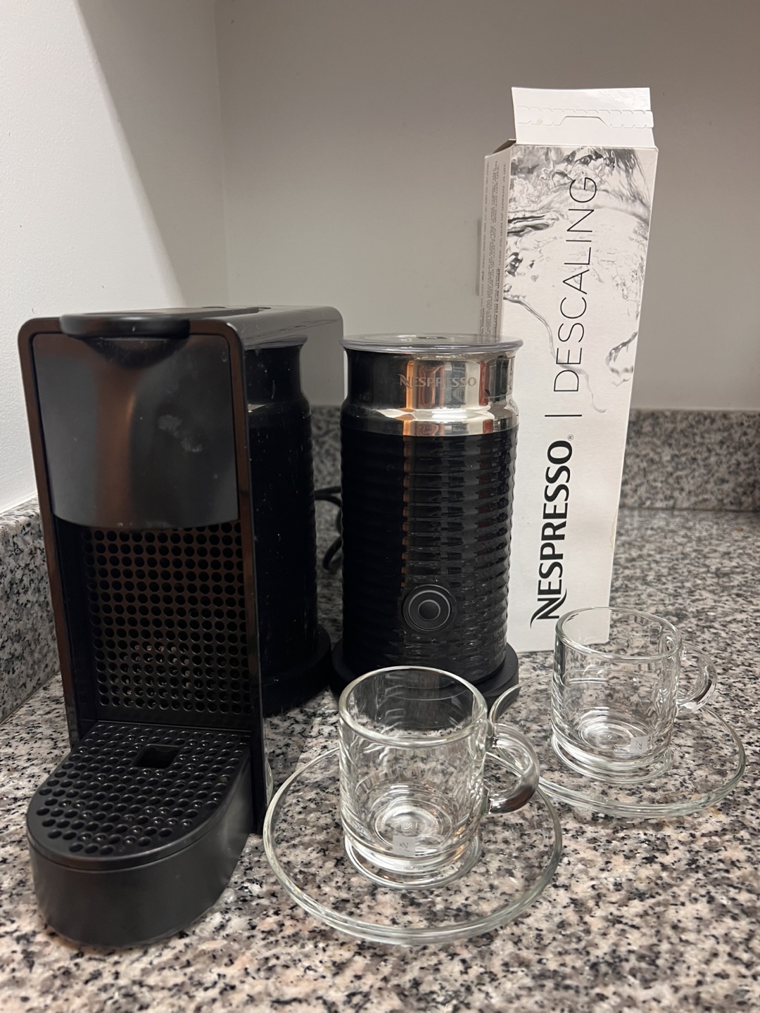 Nespresso machine w/ milk frother, 2 espresso glasses, descaler