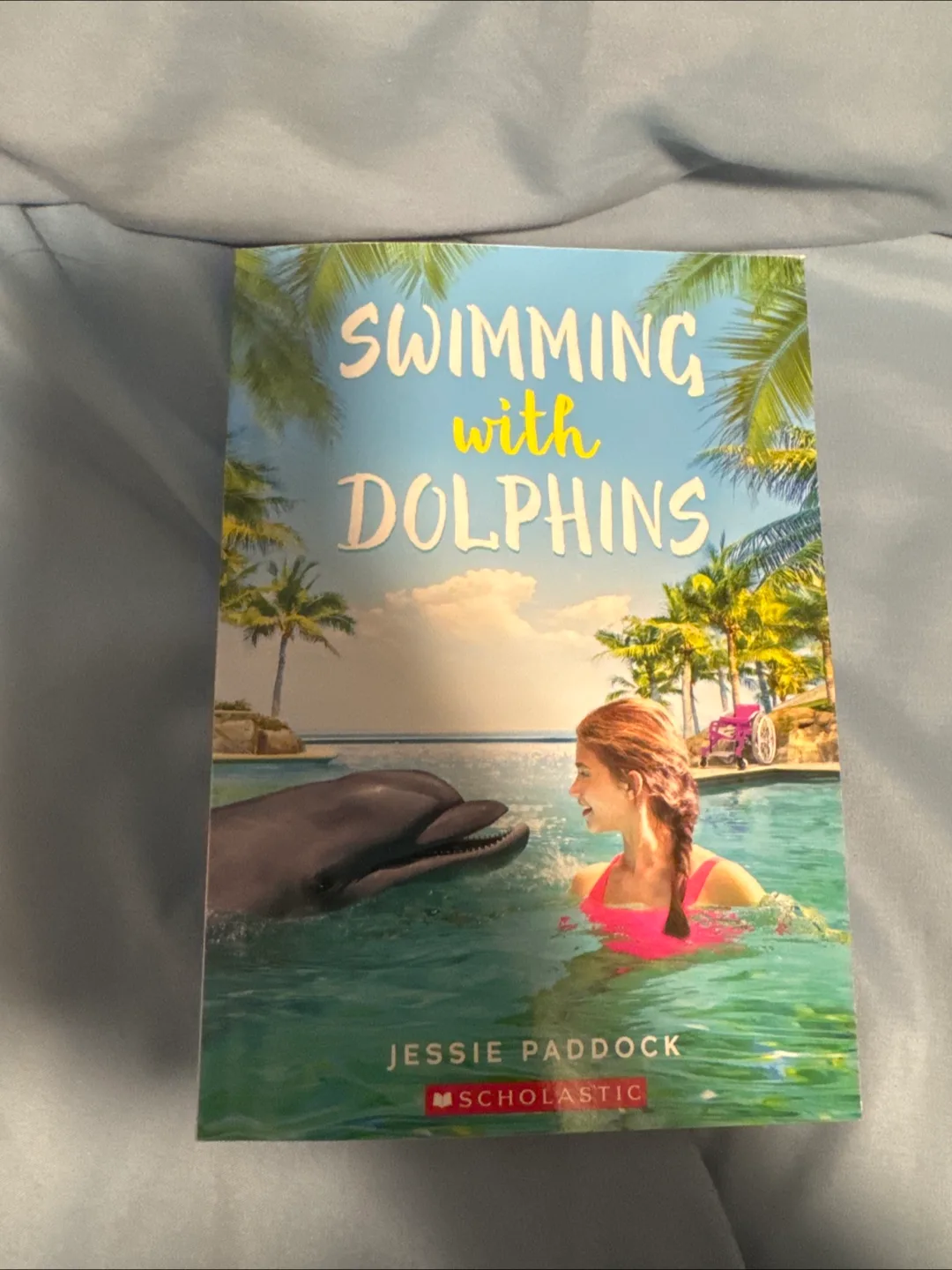 Swimming with Dolphins by Jessie Paddock thumbnail