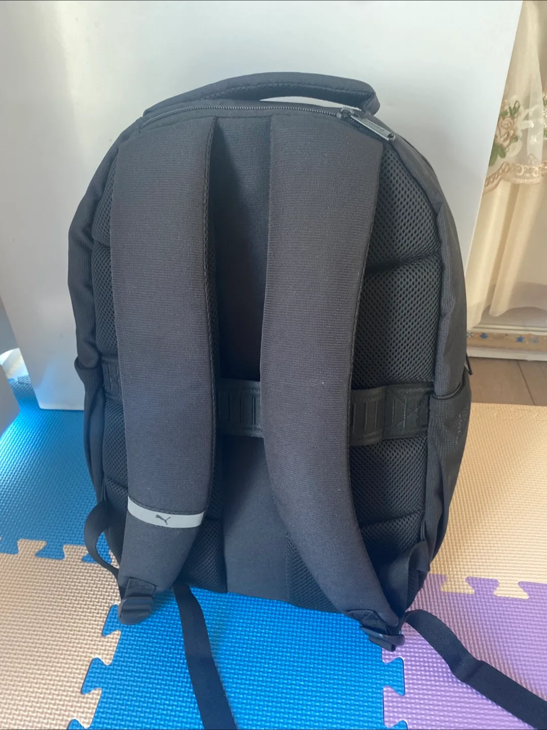 Puma Black Backpack with surprise goodies inside image indicator(2)