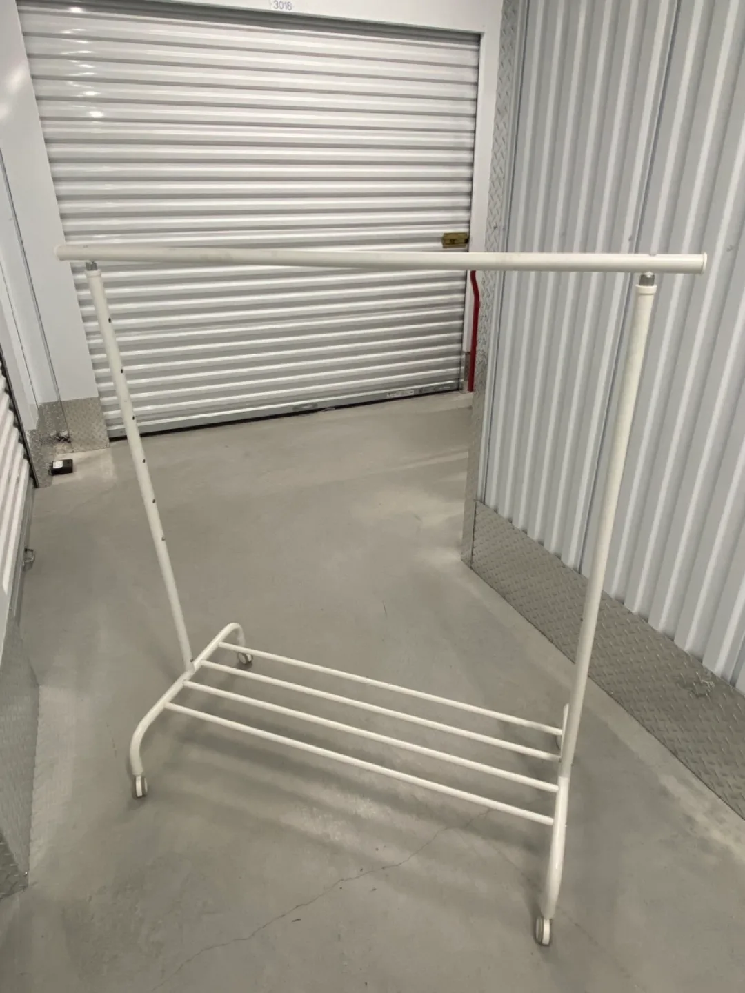 White Clothes Rack on Wheels image indicator(2)