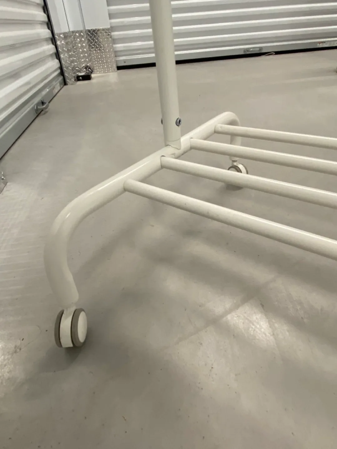 White Clothes Rack on Wheels image indicator(4)