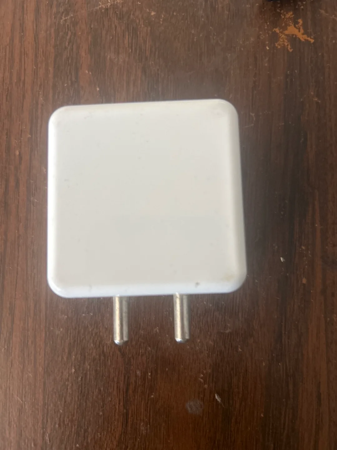 White Apple Power Adapter thumbnail