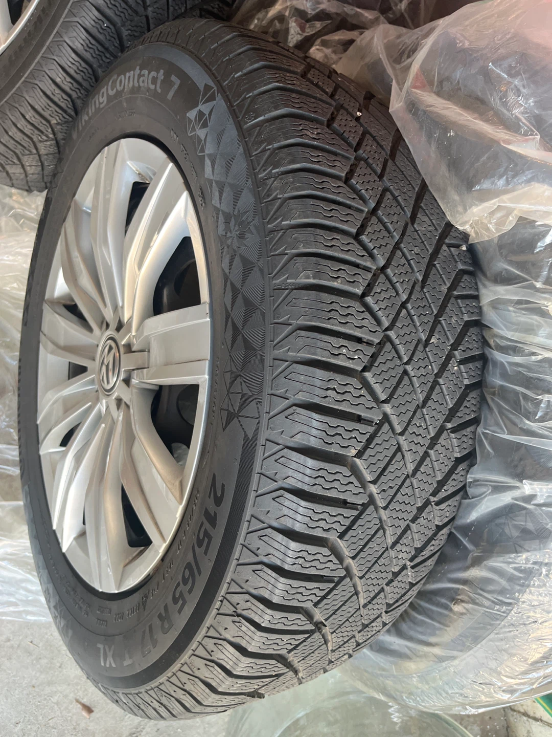 VW Tiguan Continental Winter Tires on Steel Rims with Hub caps
