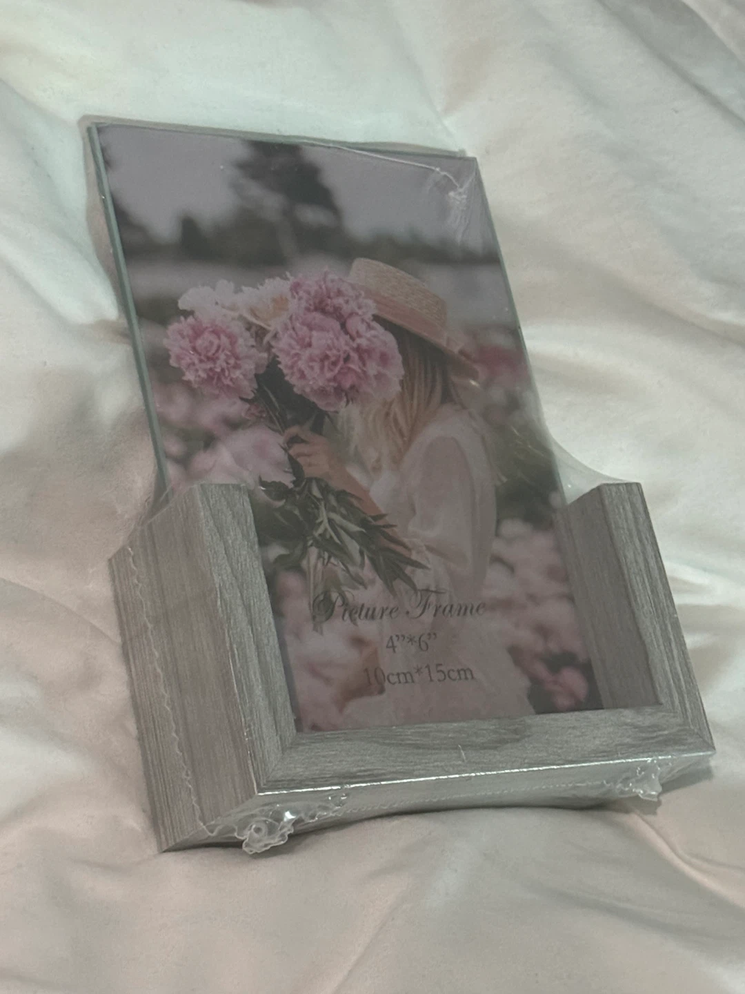 New double sided 4"x6" Picture Frame on Grey Wood