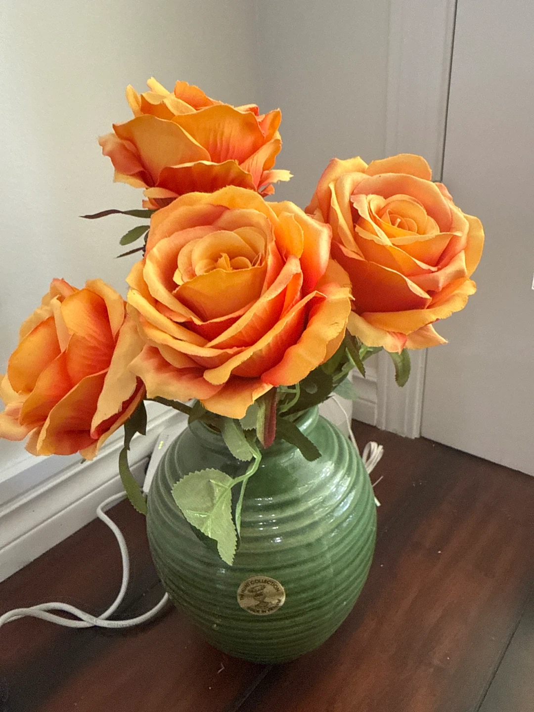 Artificial Orange Roses in Green Vase