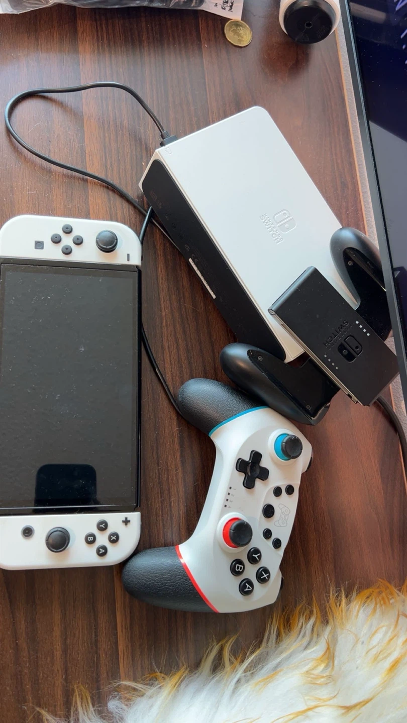 Nintendo Switch OLED Console with 3 Games