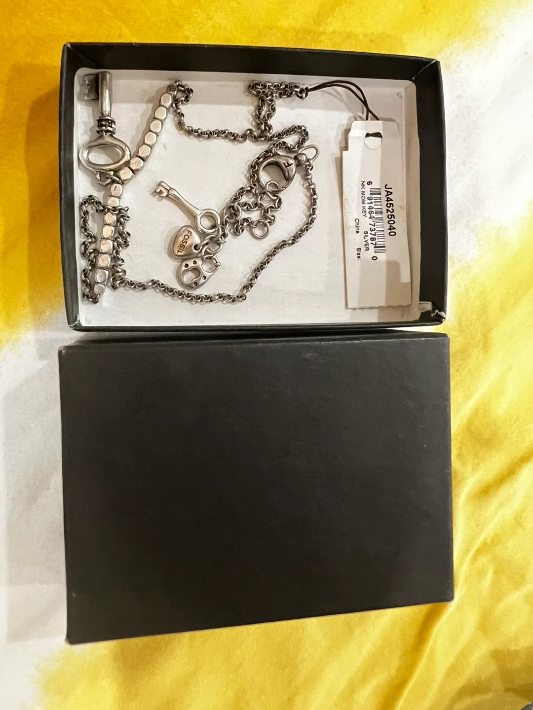 Fossil Key Necklace - New in Box! image indicator(2)