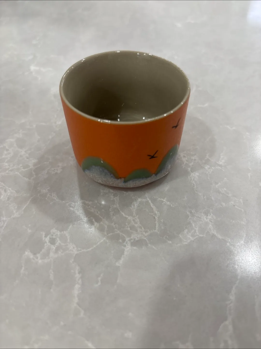 Free Orange Ceramic Cup with Bird Design thumbnail