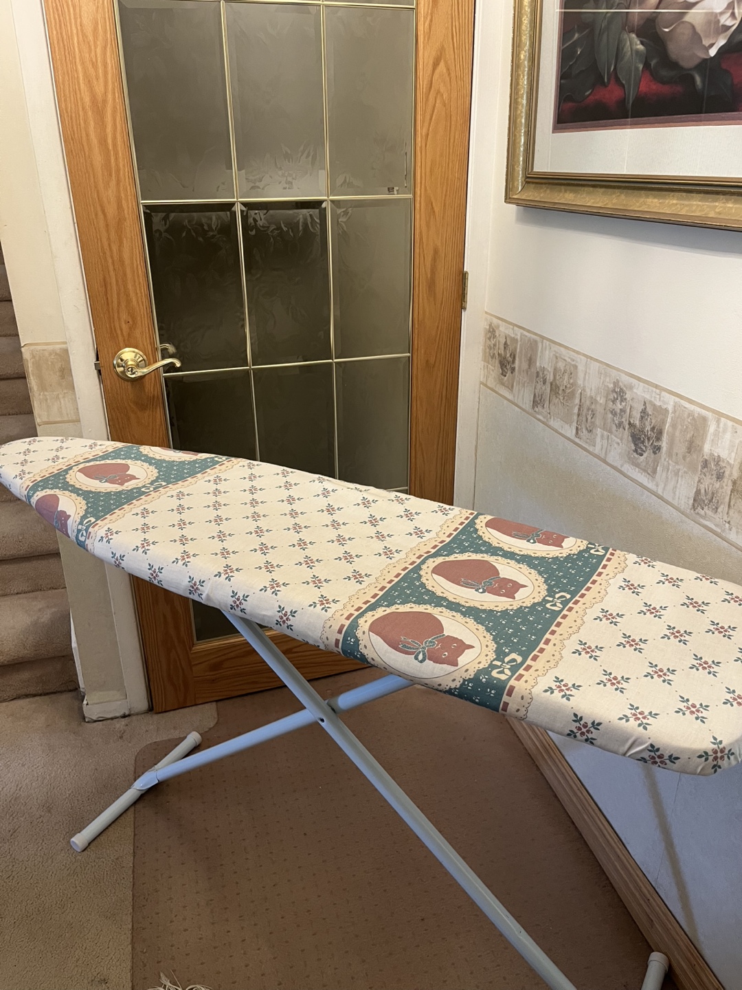 Ironing board with padded cover