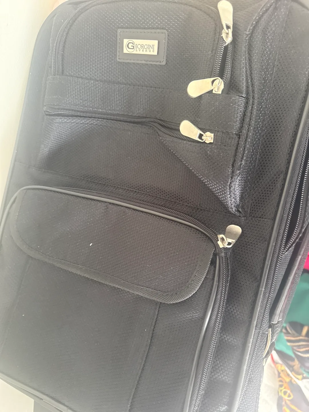 Giorgini Luggage - Black and U2M brown luggage for free image indicator(3)