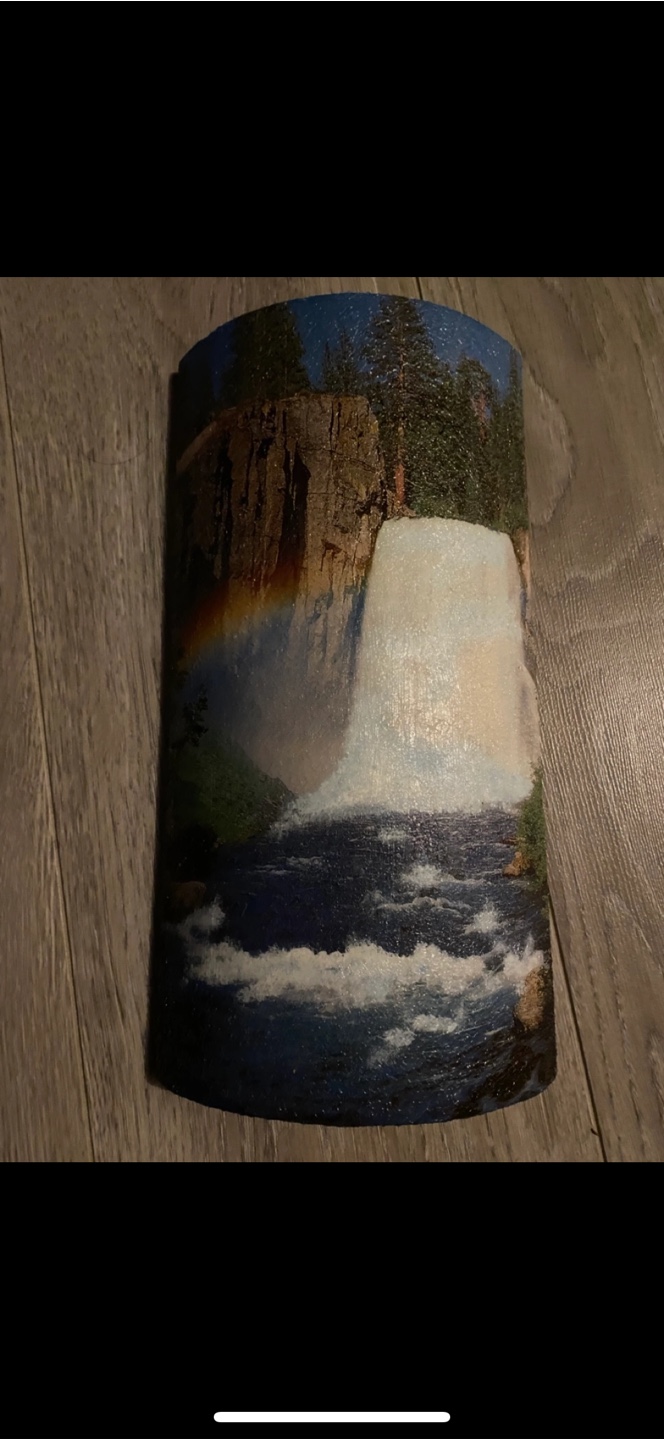 Clay decorating item with waterfall scene