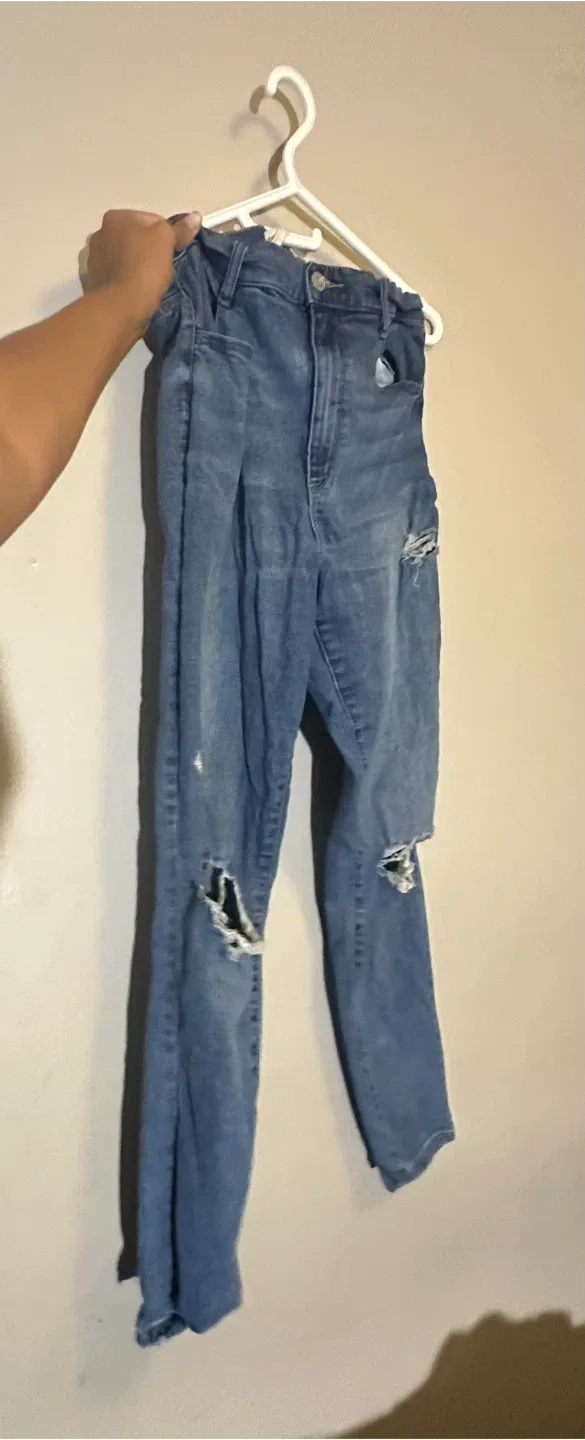Ripped Blue Jeans thumbnail