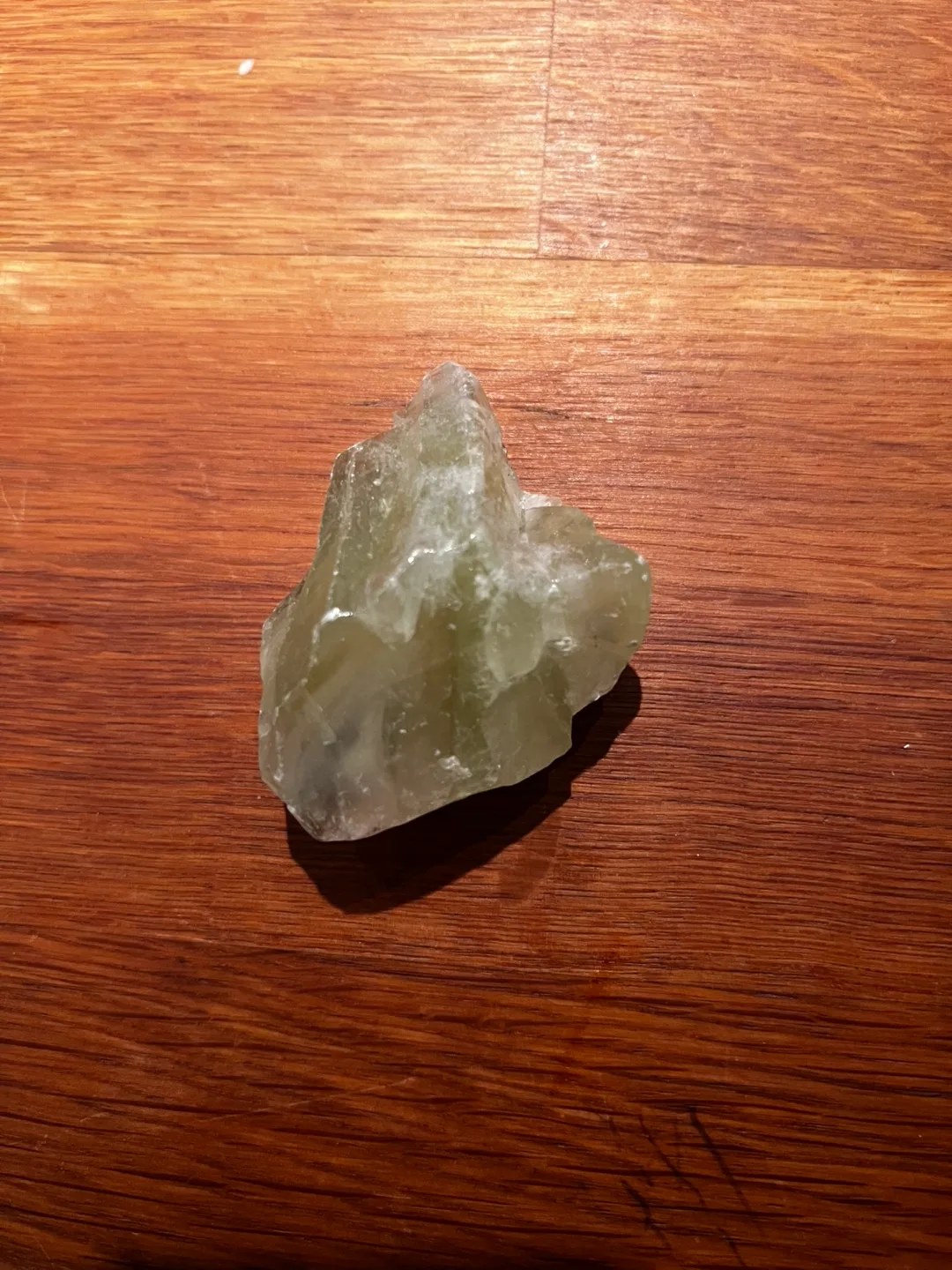 Green calcite about 2 inches long one and a half inches wide image indicator(2)