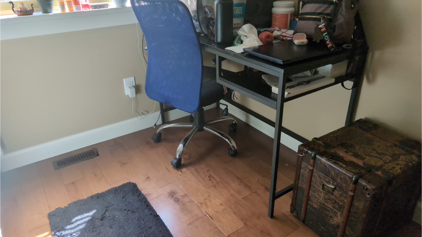 Desk and Blue Mesh Office Chair