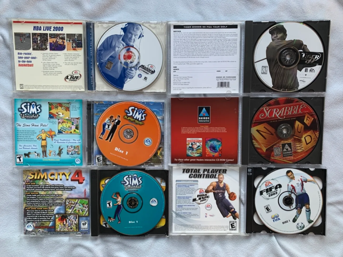 PC GAMES LOT Tiger Woods 99 Madden FIFA The Sims Scramble image indicator(3)