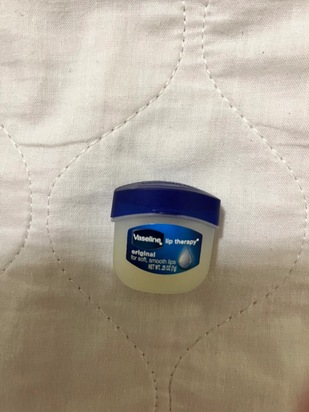 Empty Vaseline Lip Therapy 0.25 oz jar