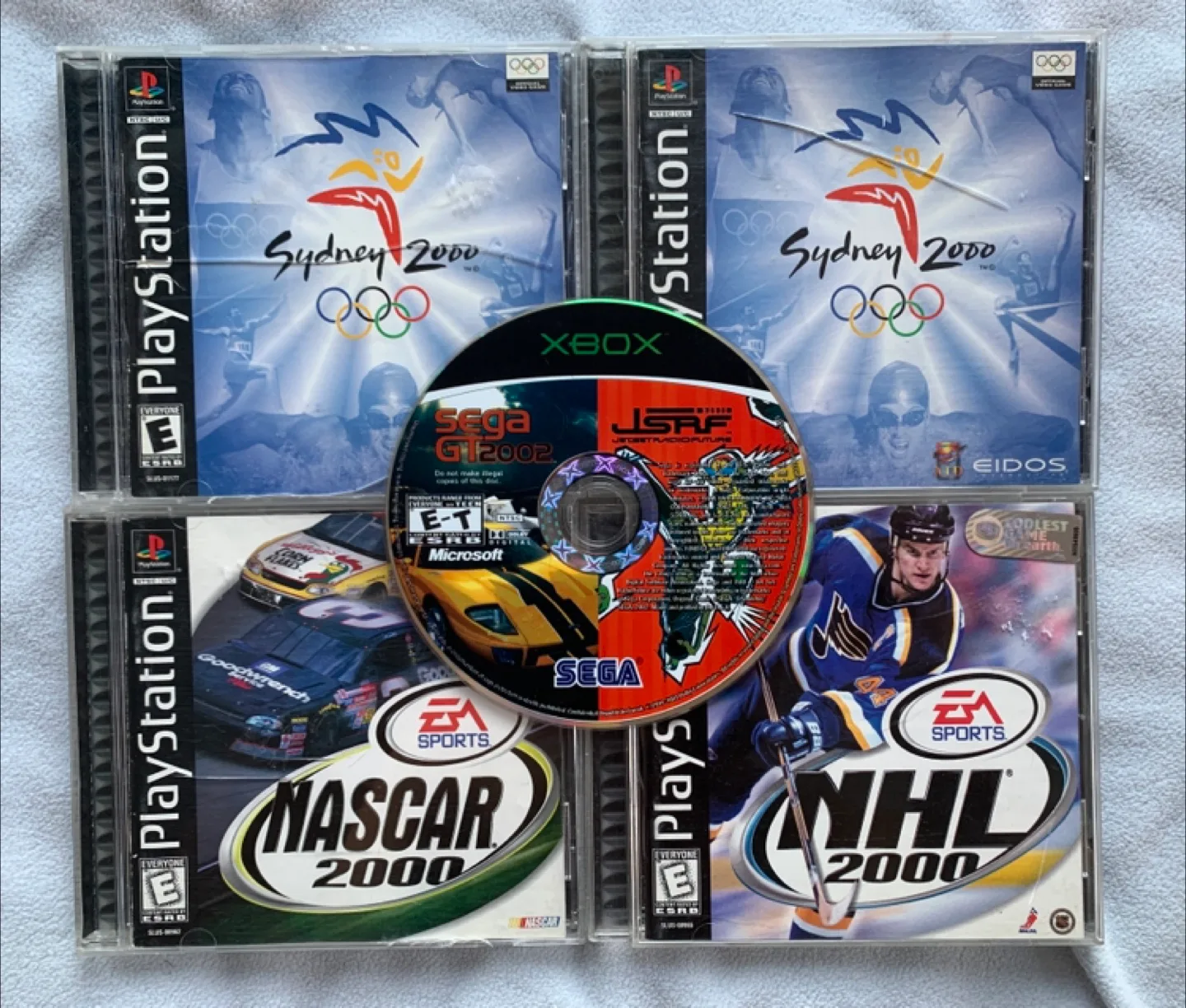 PS1 Lot NHL 2000 Sidney 2000 NASCAR 2000 + Sega GT Jet Set Radio thumbnail