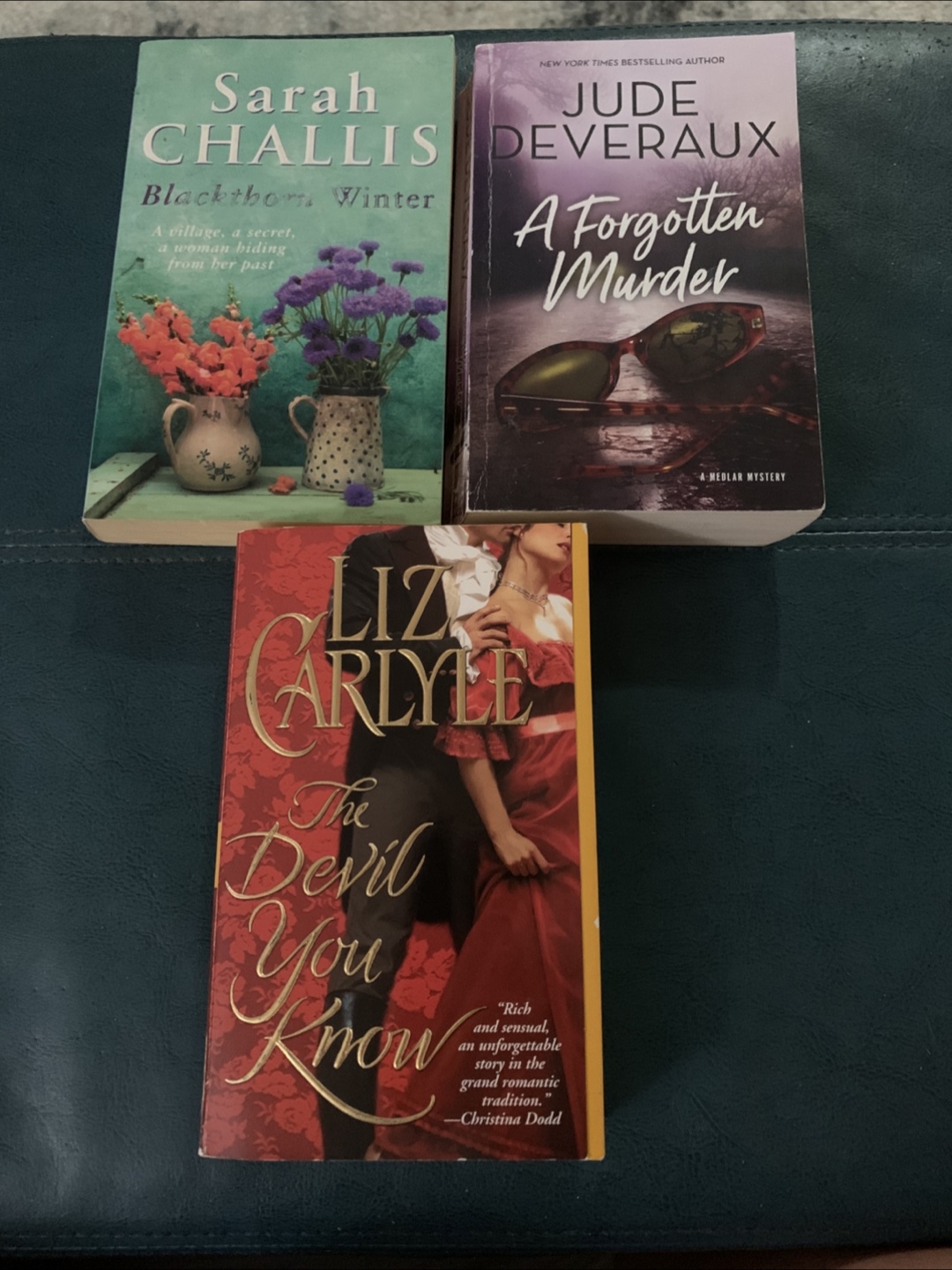 3 Paperback Novels: Challis, Deveraux, Carlyle