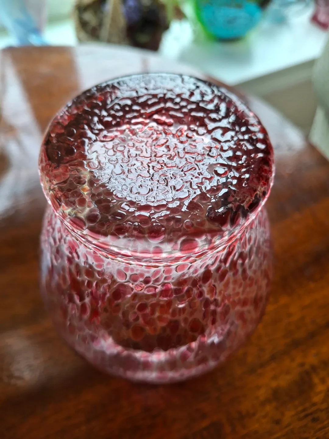 Small pink/cranberry coloured glass vase image indicator(3)