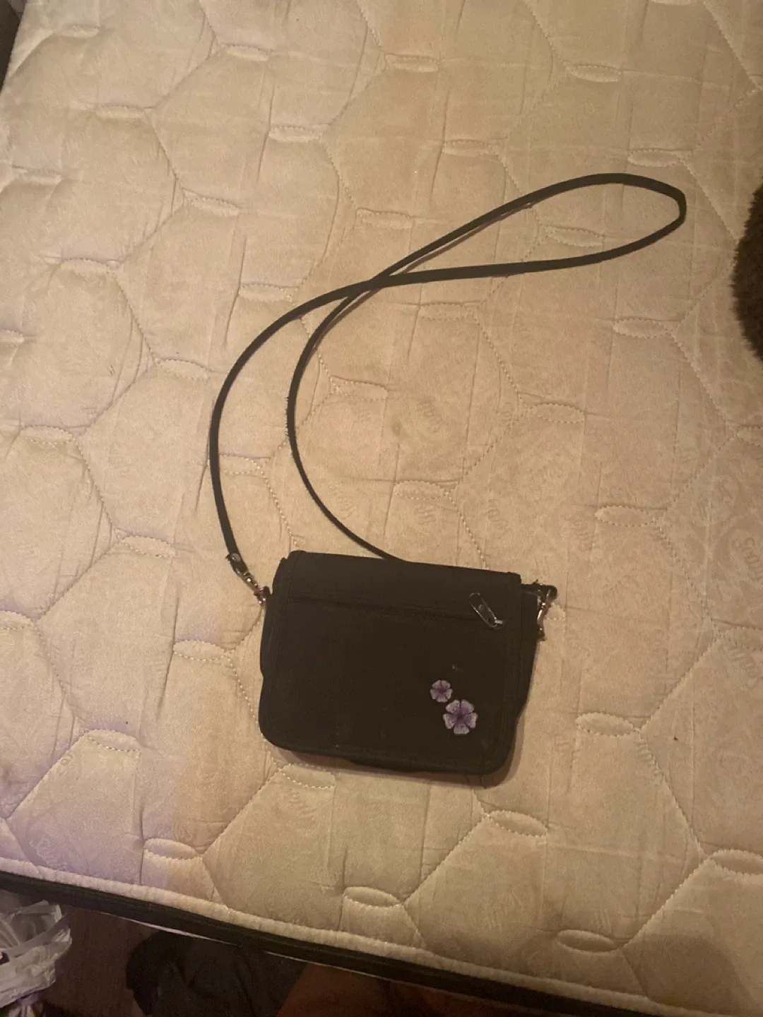 Black crossbody bag with floral details thumbnail