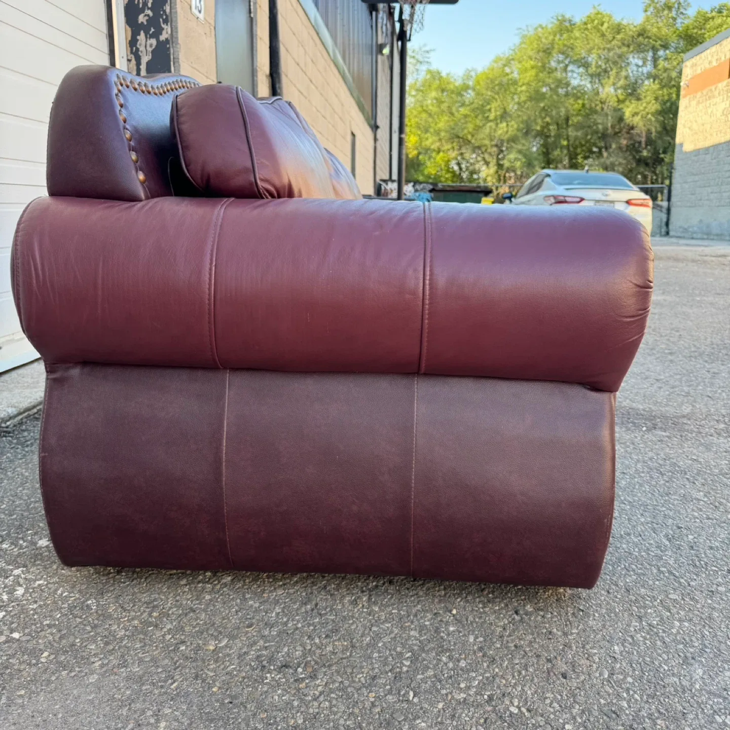 Burgundy Leather Loveseat with Nailhead Trim – Used image indicator(4)