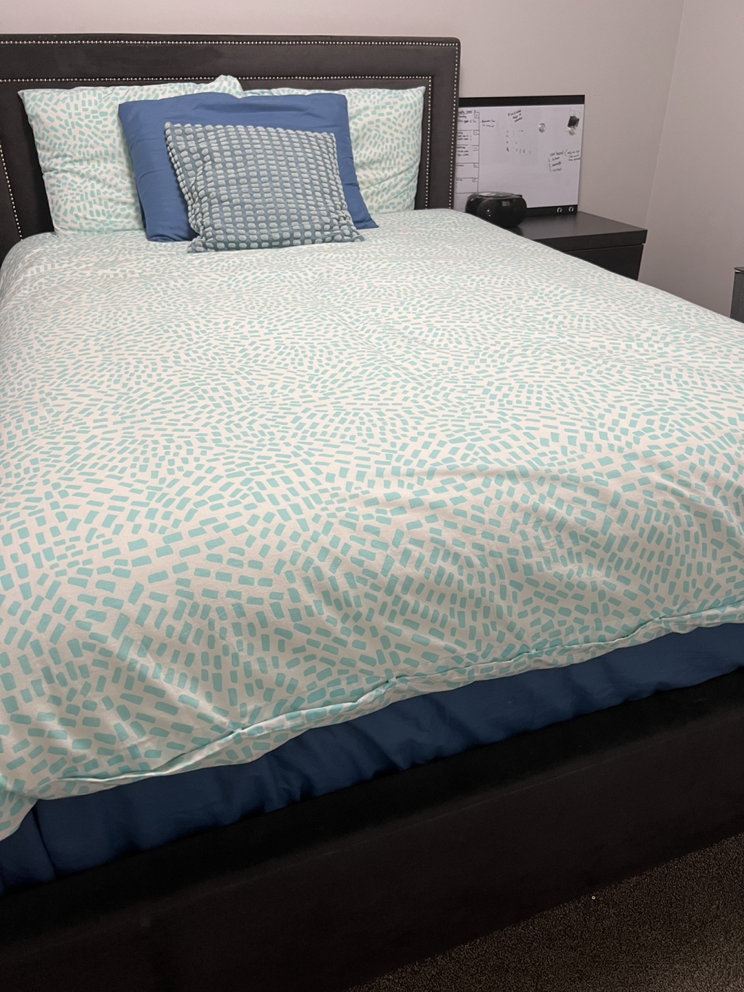 Queen size bed with mattress and two nightstands